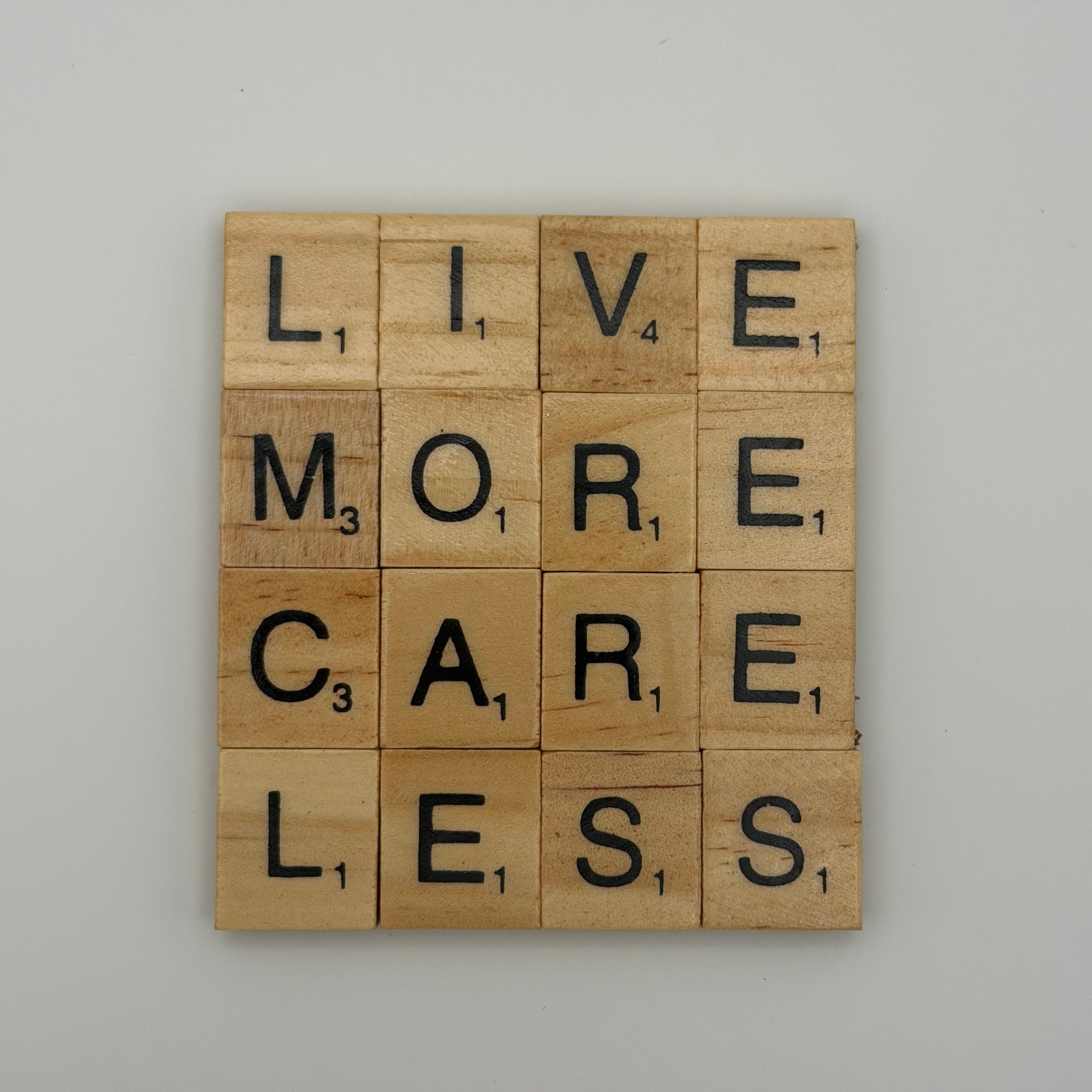 “Live More Care Less” Coaster
